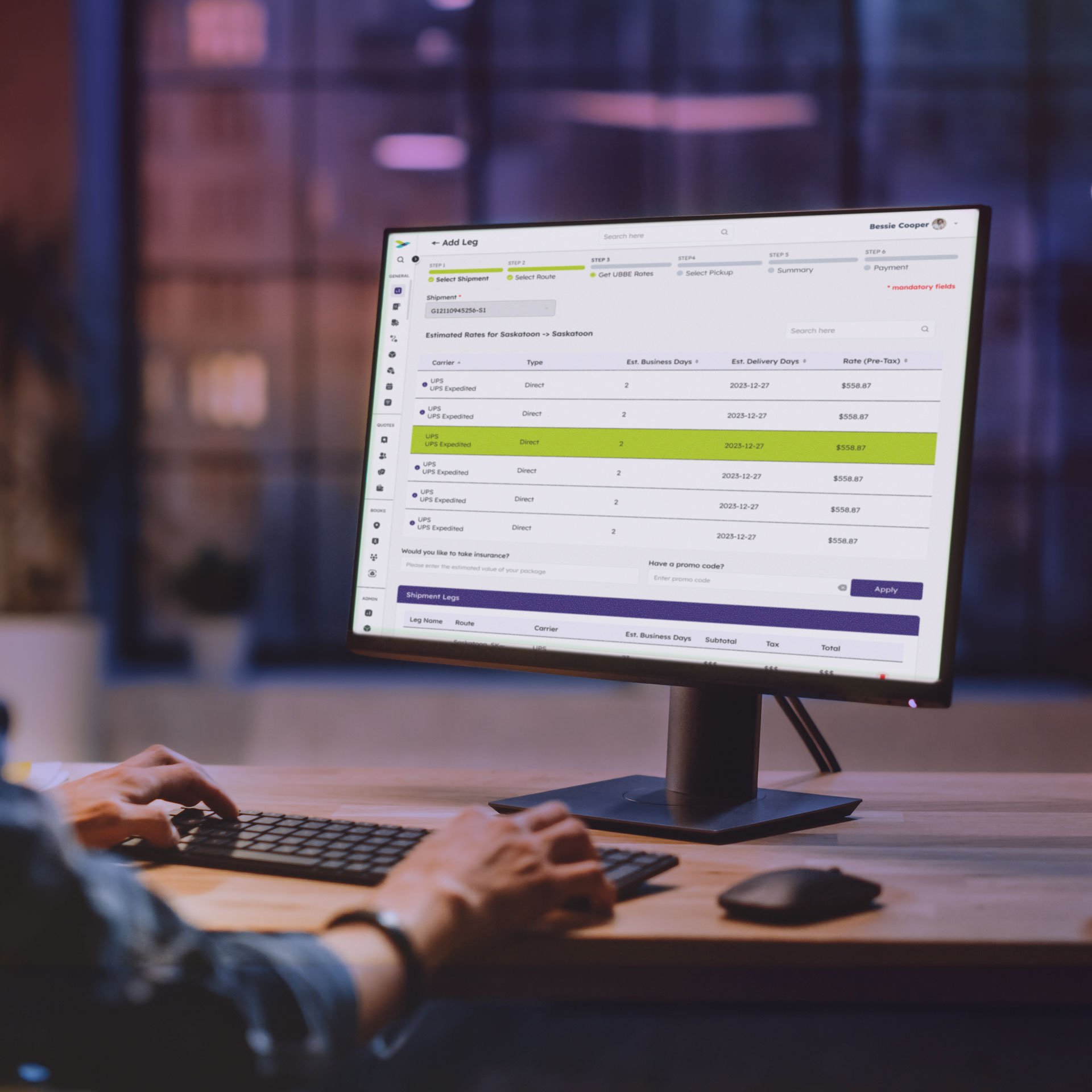 hands on a keyboard showing a montitor of BBE's spreadsheets