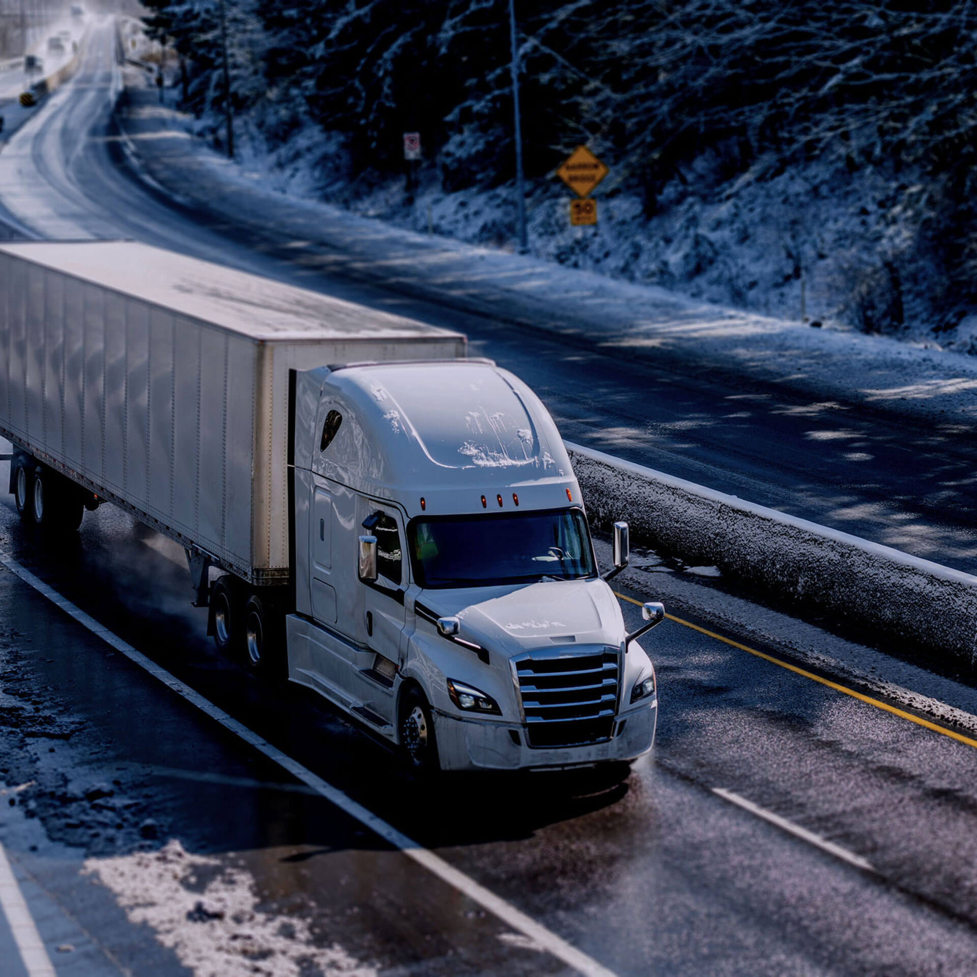 close up of a semi truck on a highway